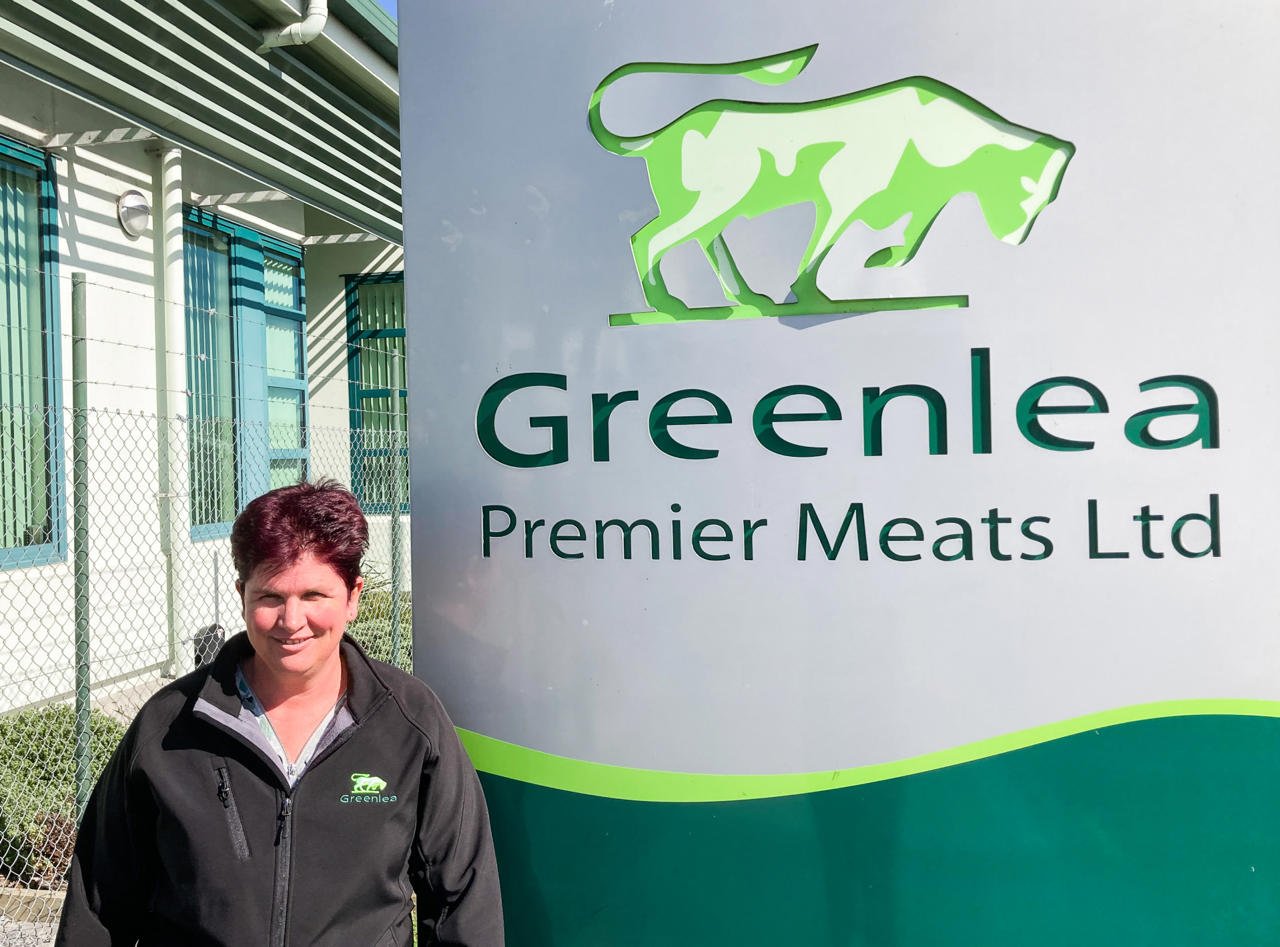 KATHRYN HAAMI KATHRYN HAAMI in front of Greenlea sign